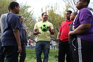 Group of men gather to play soccer as part of the Men's cancer support and education program.