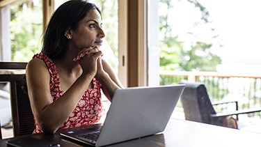 Patient using her Laptop device.