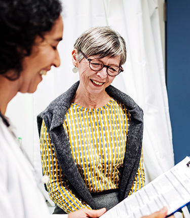 Patient engaging with medical professional during clinical trials. 